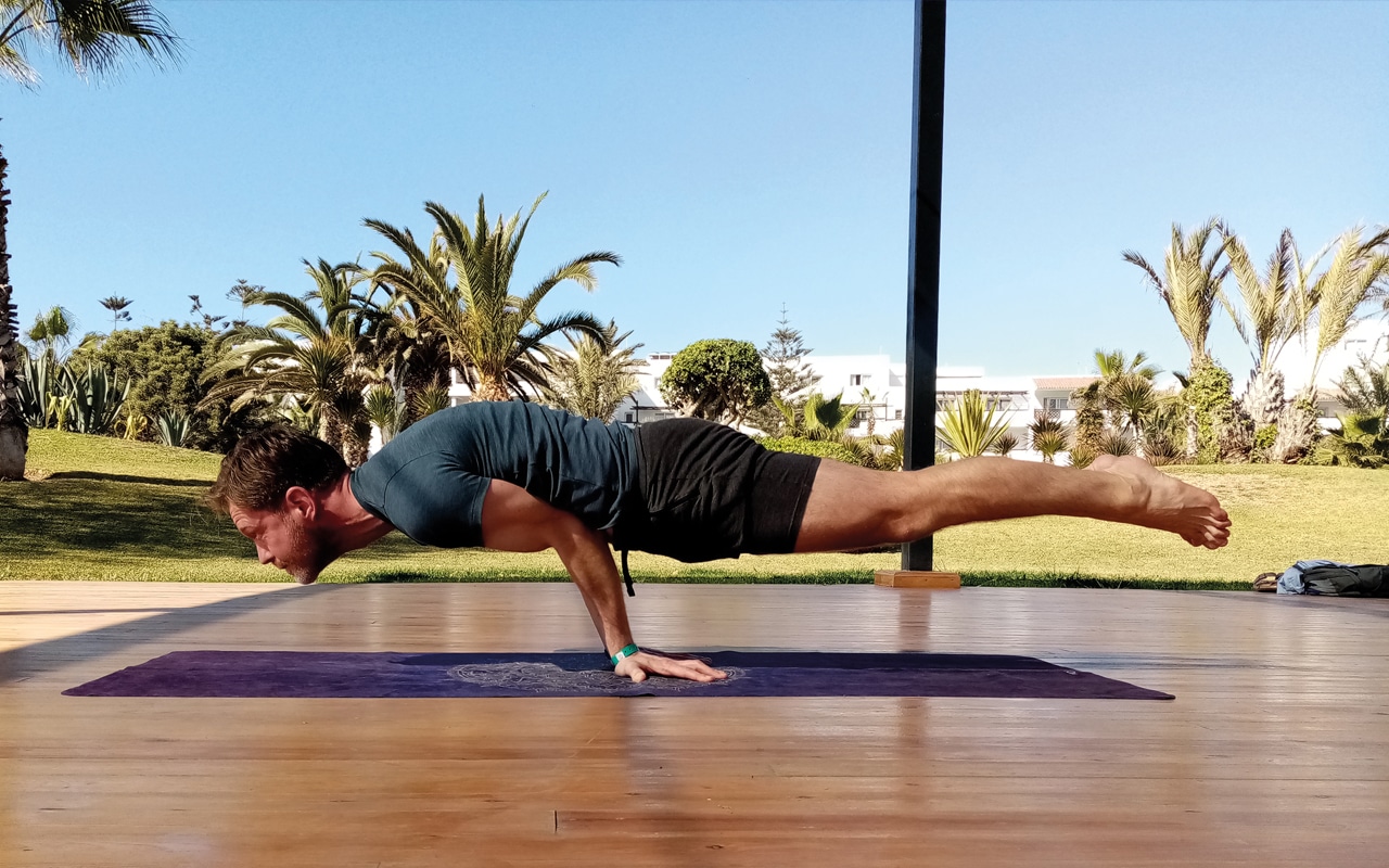 Peacock Pose - Marc Roberts | Om Yoga Magazine