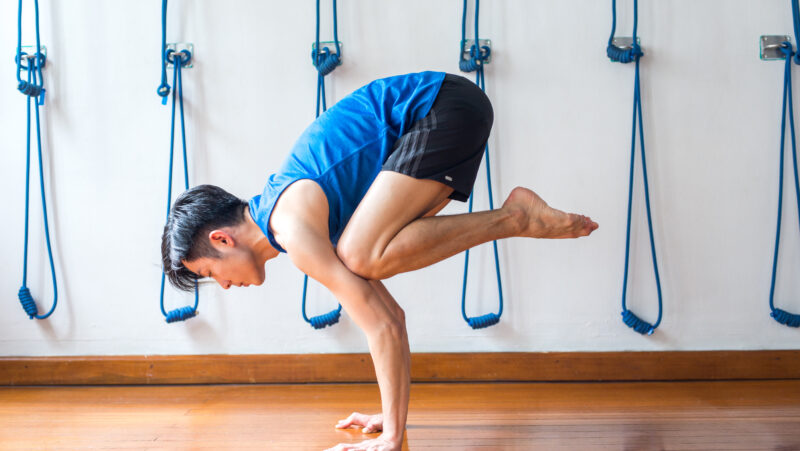 Jeremy Lim - crow pose -man on the mat