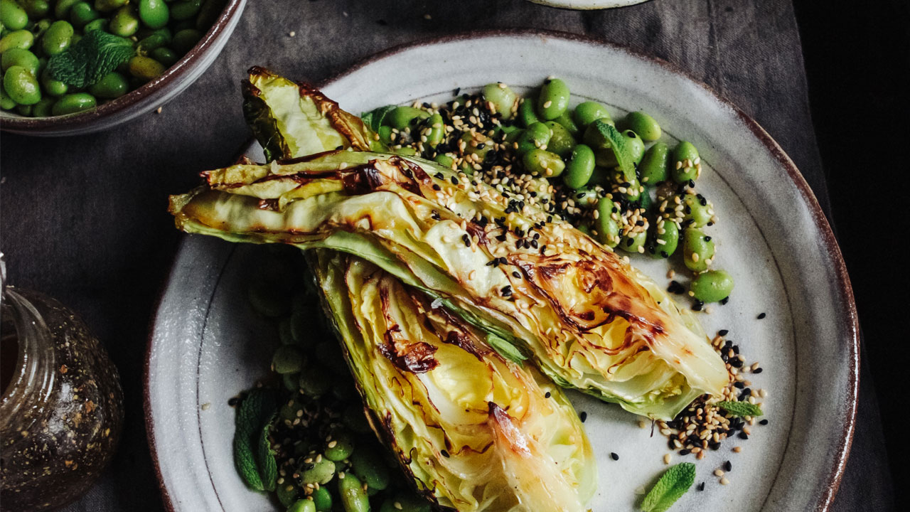 Charred Hispi cabbage with sesame edamame and gomashio