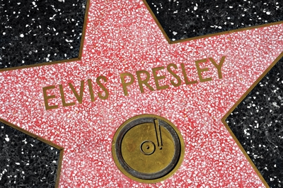 LOS ANGELES - OCTOBER 16: Elvis Presley star in Hollywood Walk of Fame on October 16, 2011 in Los Angeles. Those more than 2,400 five-pointed stars attracts about 10 million visitors annually