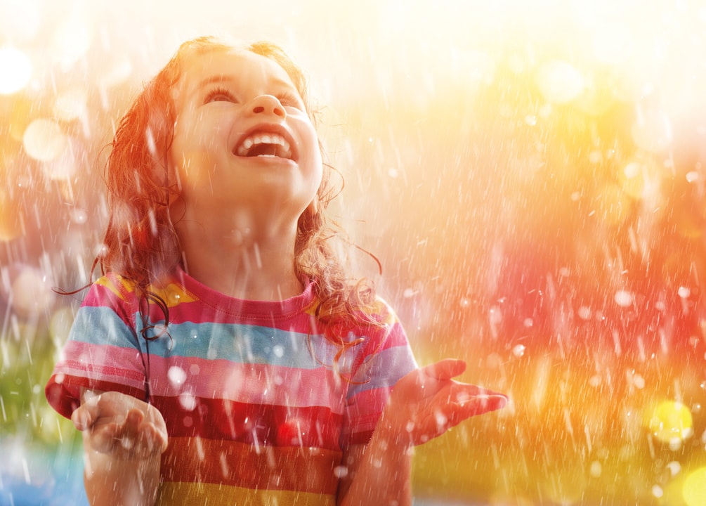 The,Child,Is,Happy,With,The,Rain Sunny days