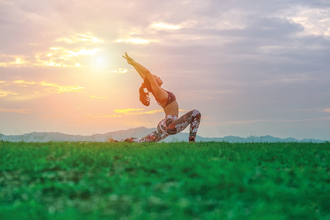 YOGA : Beautiful young woman doing yoga in the summer park. Healthy lifestyle. Various yoga postures.