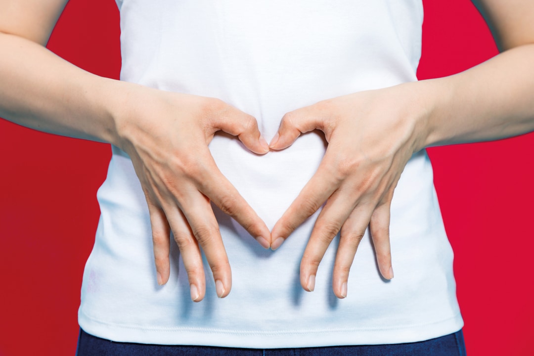 Young,Woman,Who,Makes,A,Heart,Shape,By,Hands,On Cooking for a healthy gut