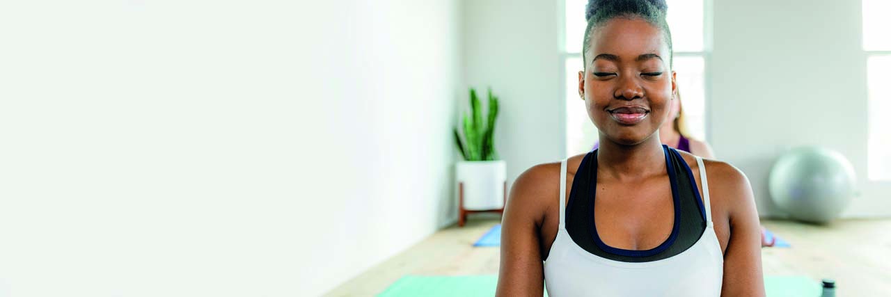 Black,Lady,Doing,A,Sukhasana,Yoga,Pose What holds you back?