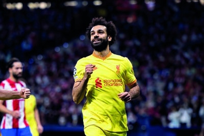 MADRID - OCT 19: Mo Salah celebrates after scoring a goal at the UCL match between Club Atletico de Madrid and Liverpool FC at the Metropolitano Stadium on October 19, 2021 in Madrid, Spain.