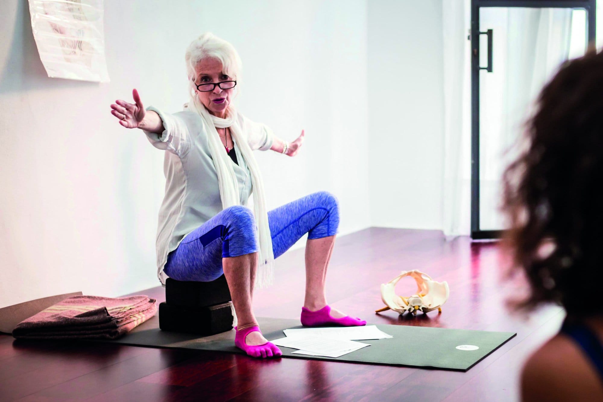 Lolly Stirk seated teaching 800x580 Lolly Stirk seated teaching 800x580