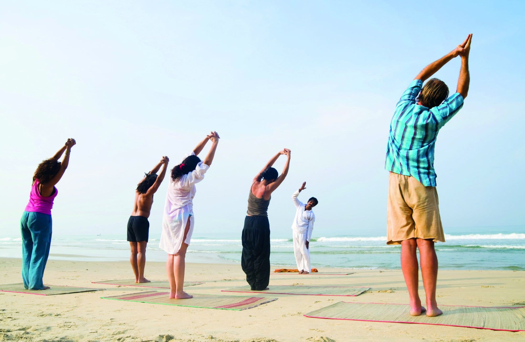 Yoga class by the beach.