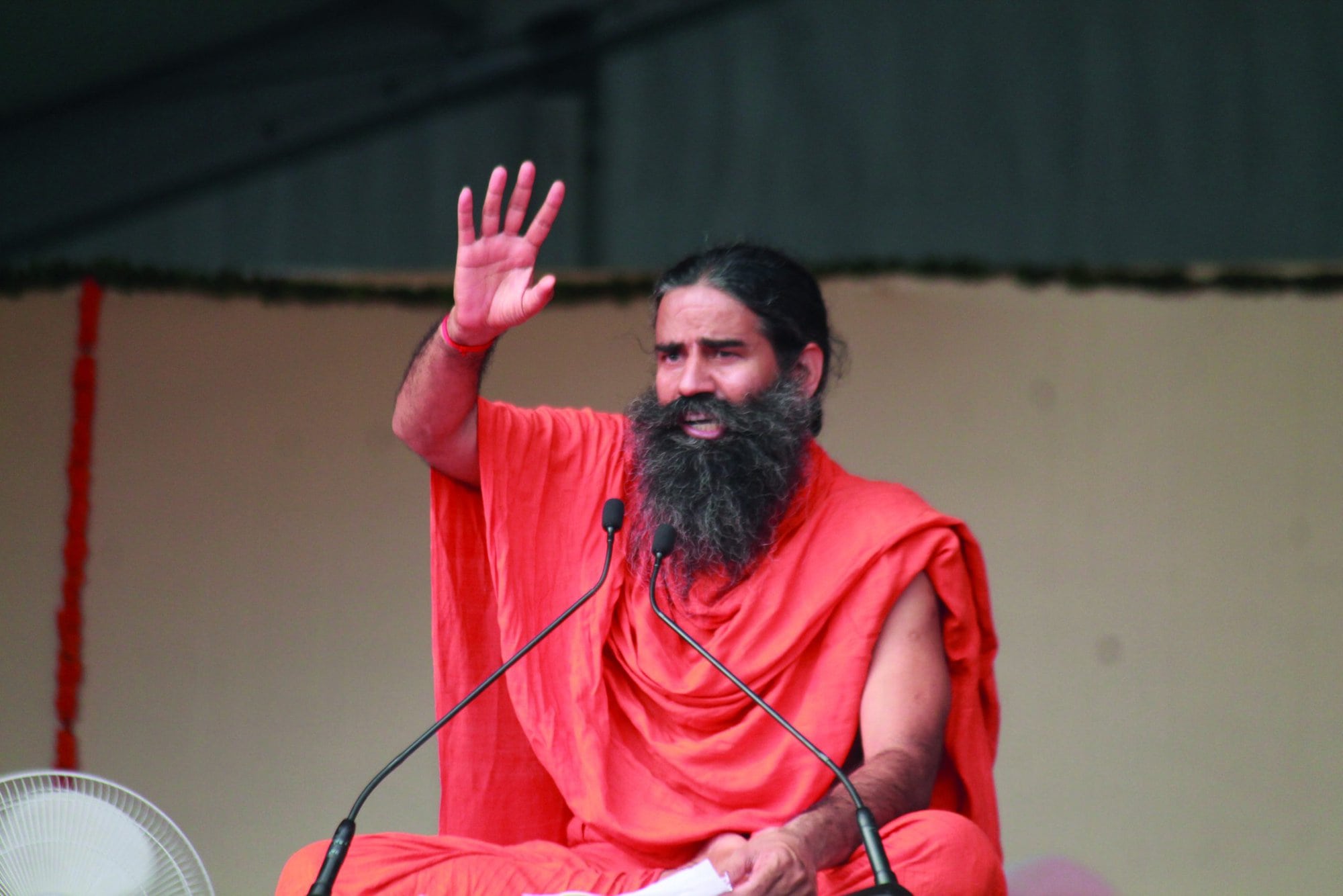 Ahmedabad, Gujarat/India- Sunday, 21 June, 2019: Two thousand students of the perform the Surya Namaskar Ramdev Sun Salutation at opening ceremony of the international yoga day Festival in Ahmedabad