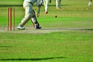 Cricket batsman making strokes in a match