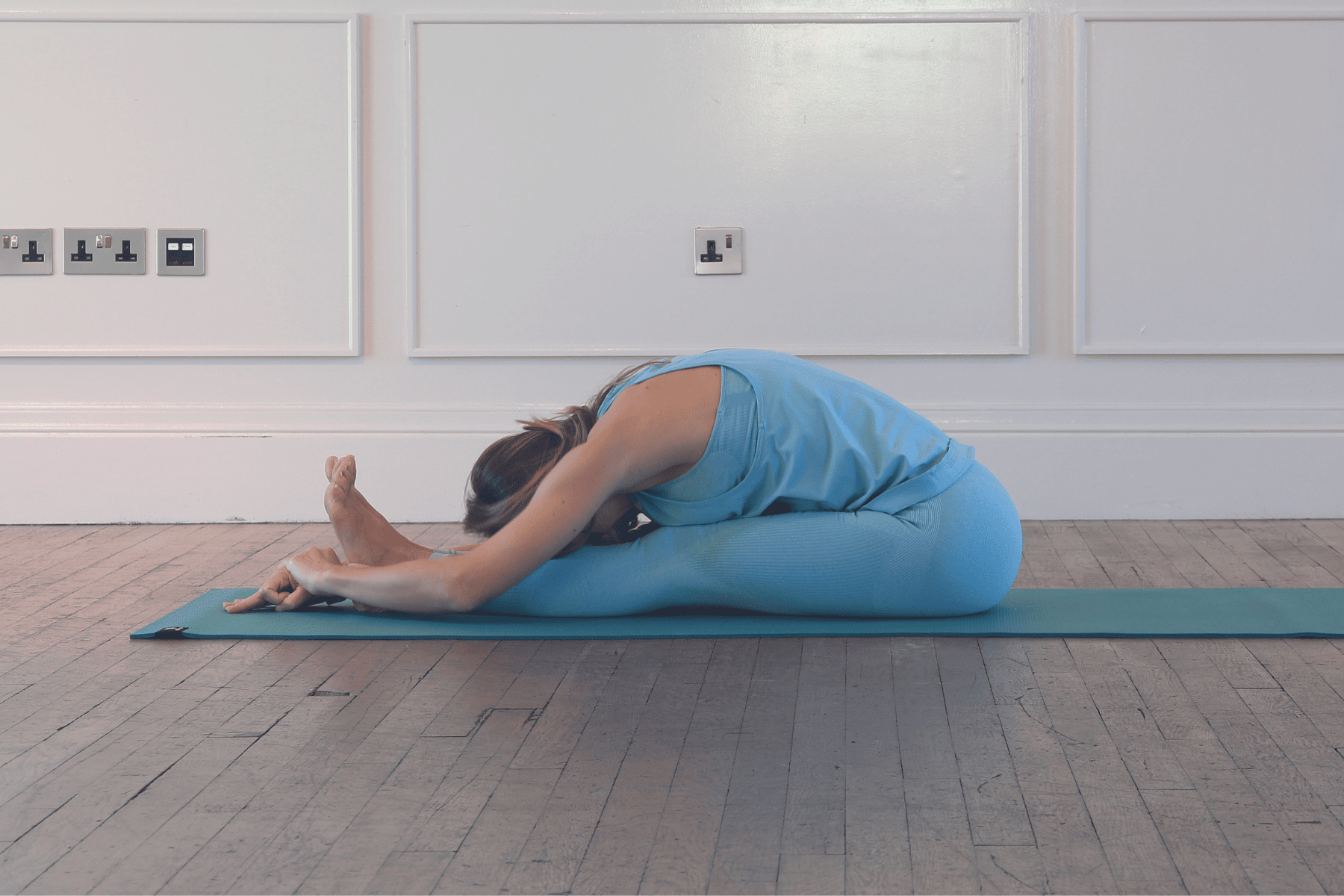 5. Seated Forward Fold (Paschimottanasana)