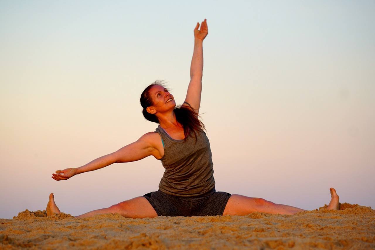 Sun-Kissed Serenity: A Two-Decade Journey of Yoga Under the Sun Sara-Andrew-yoga