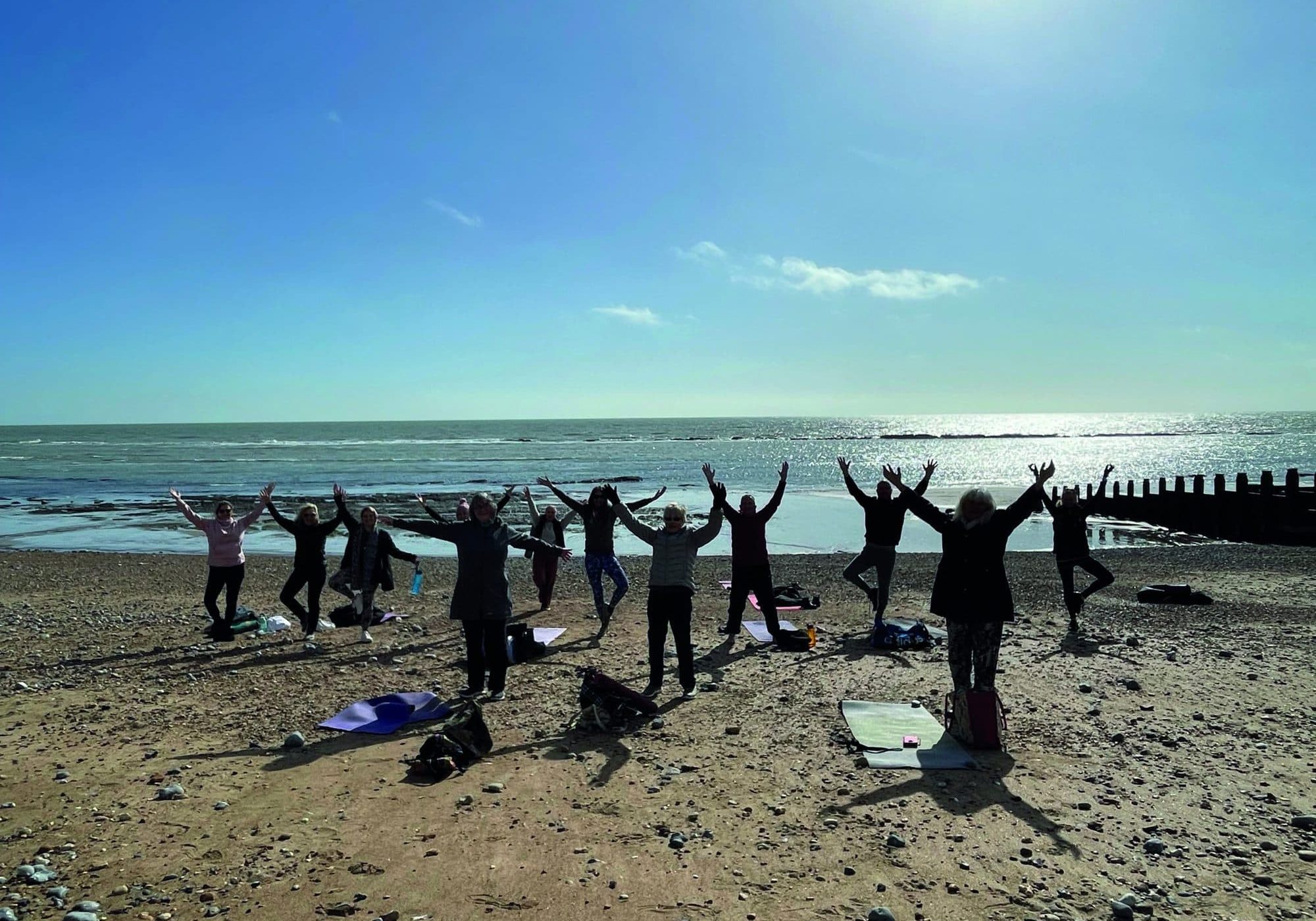 Eastbourne Beach yogis after a charity class with Eva Kristlova