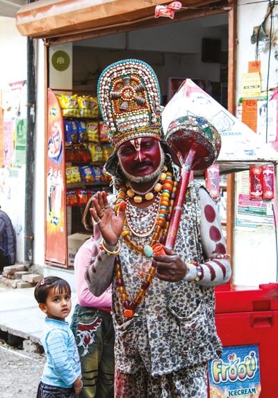 Hanuman (man dressed up with face painted)