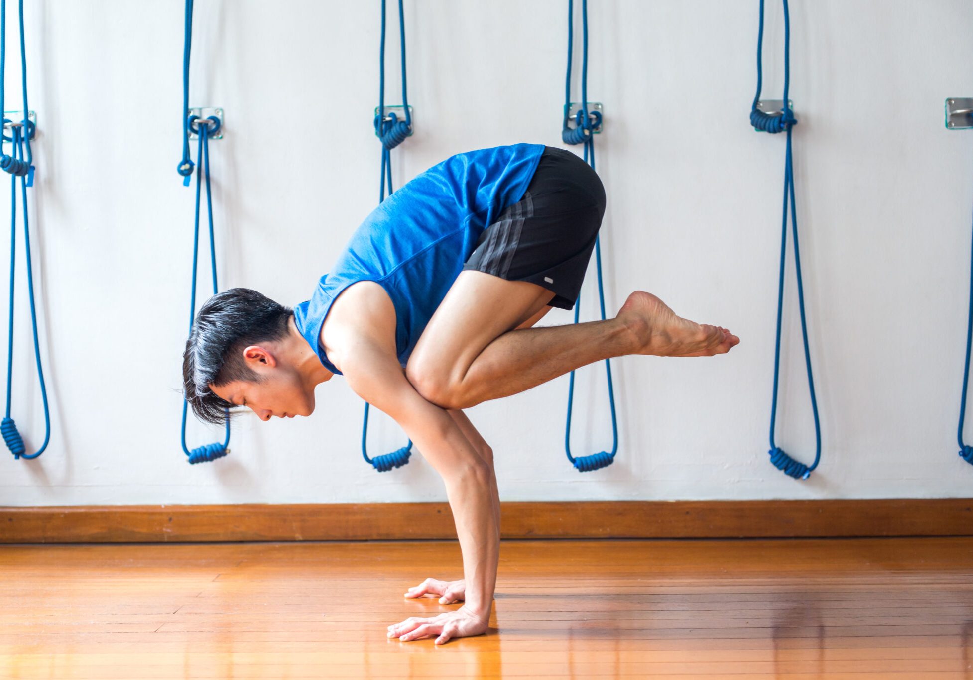 Jeremy Lim - crow pose -man on the mat