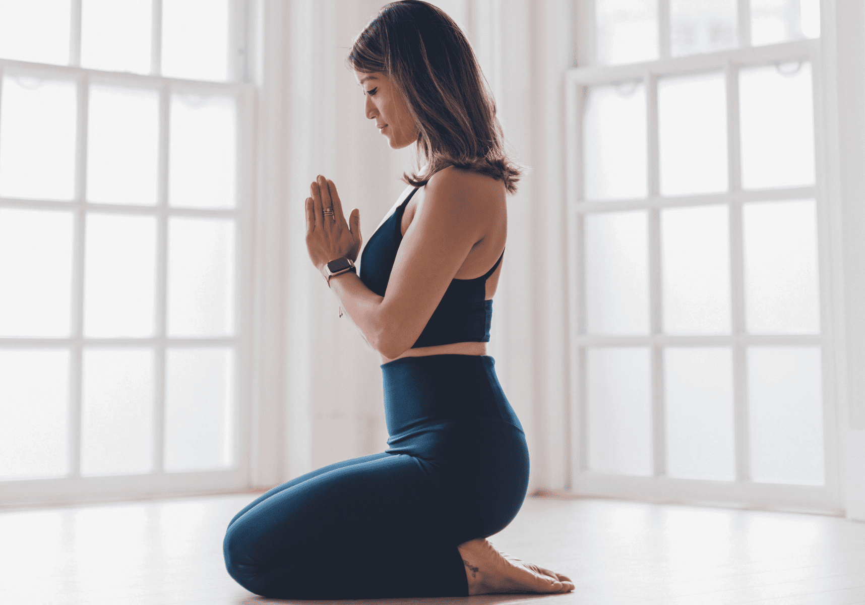 10. Vajrasana with Anjali Mudra (Kneeling With Prayer Hands)