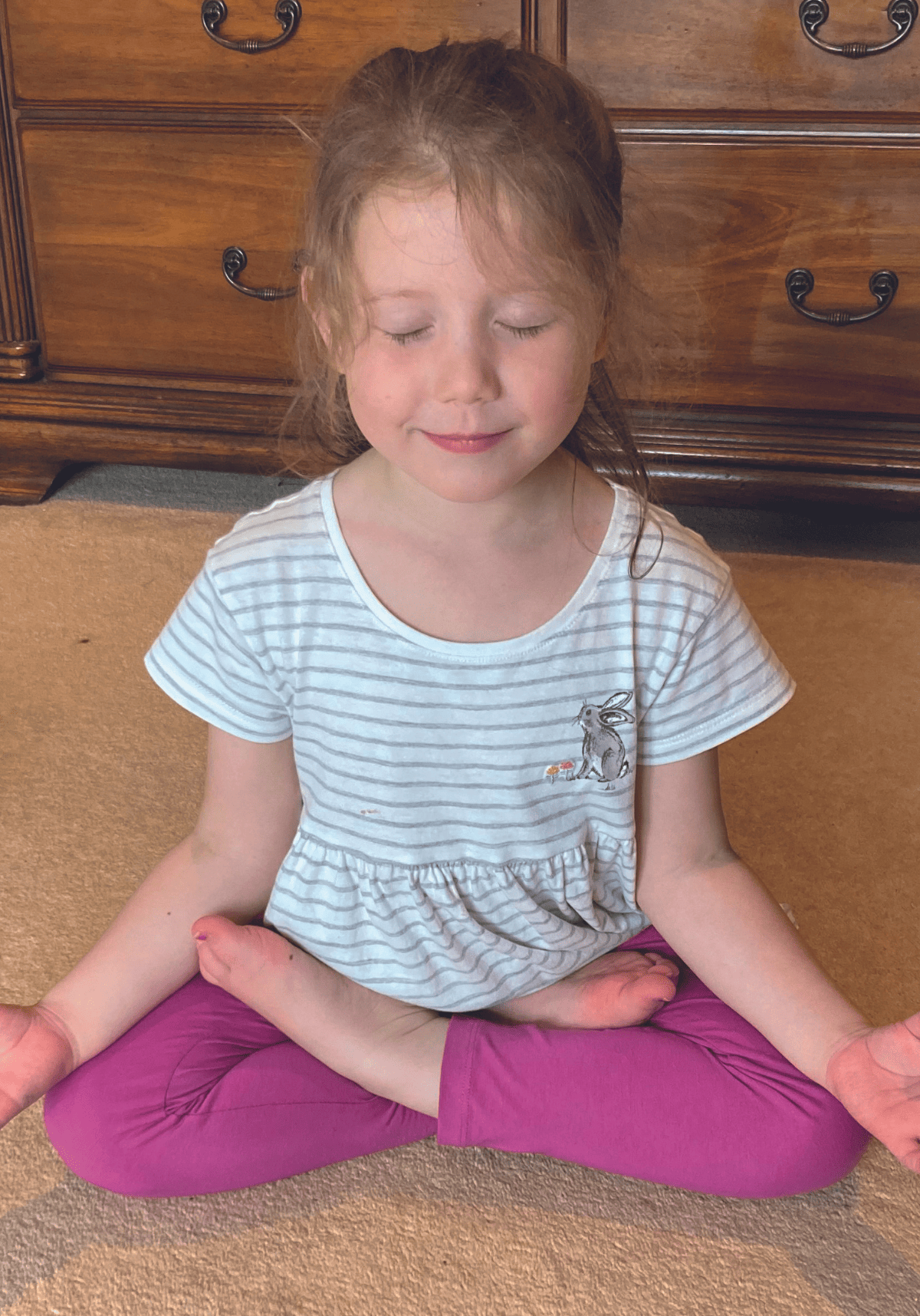 Tracey Webster’s granddaughter, Ava, in lotus pose