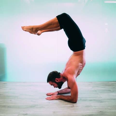 Yoga.,Young,Man,Doing,Yoga,Exercise,Isolated,On,A,White Brogi