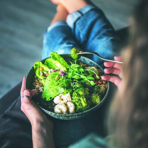 Healthy,Dinner,Or,Lunch.,Curly,Woman,In,T-shirt,And,Jeans Vegan